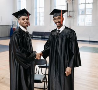 Photo of Men Shaking Hands